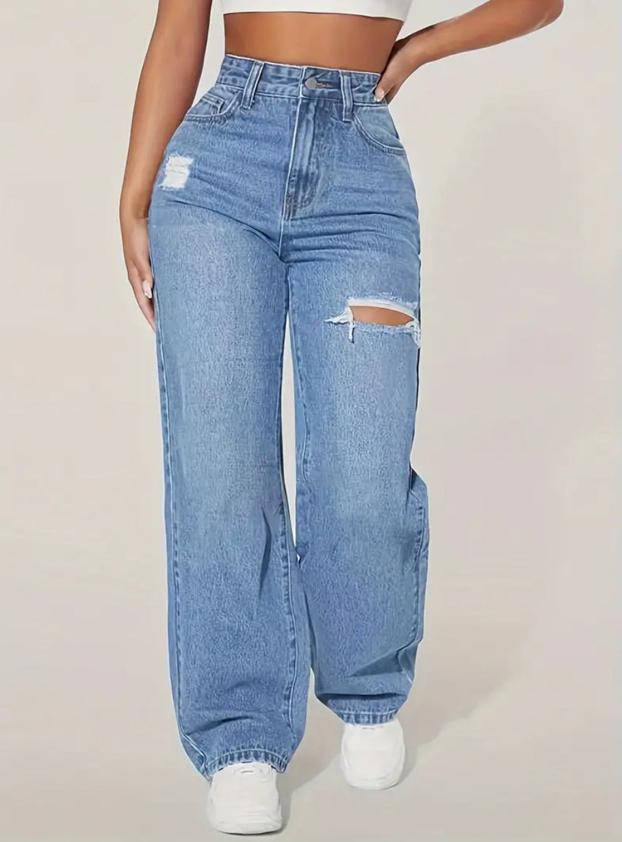 women washing water ripped denim trousers